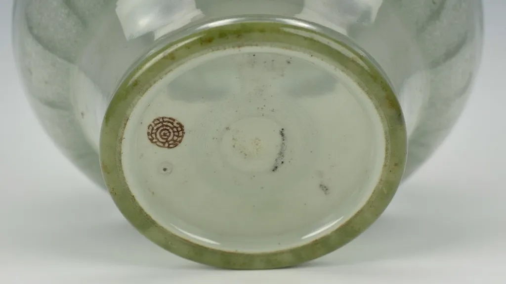 An impressed mark on a glass vase